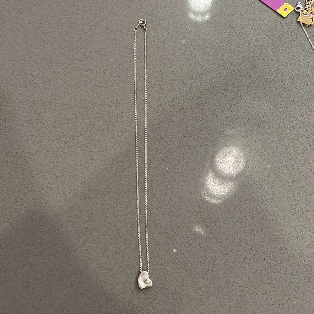 Tiffany and Co Elsa Peretti small heart necklace. Sterling silver